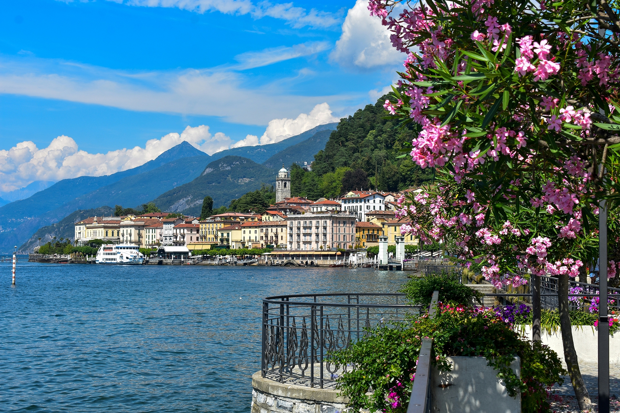 Serene view of Lake Lugano through a villa’s window near Lanzo d’Intelvi